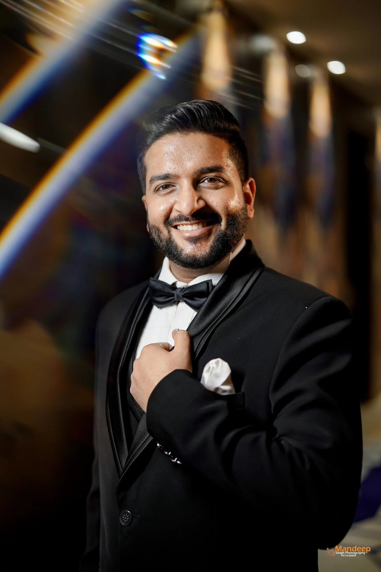 Vyom smiling in his tuxedo
