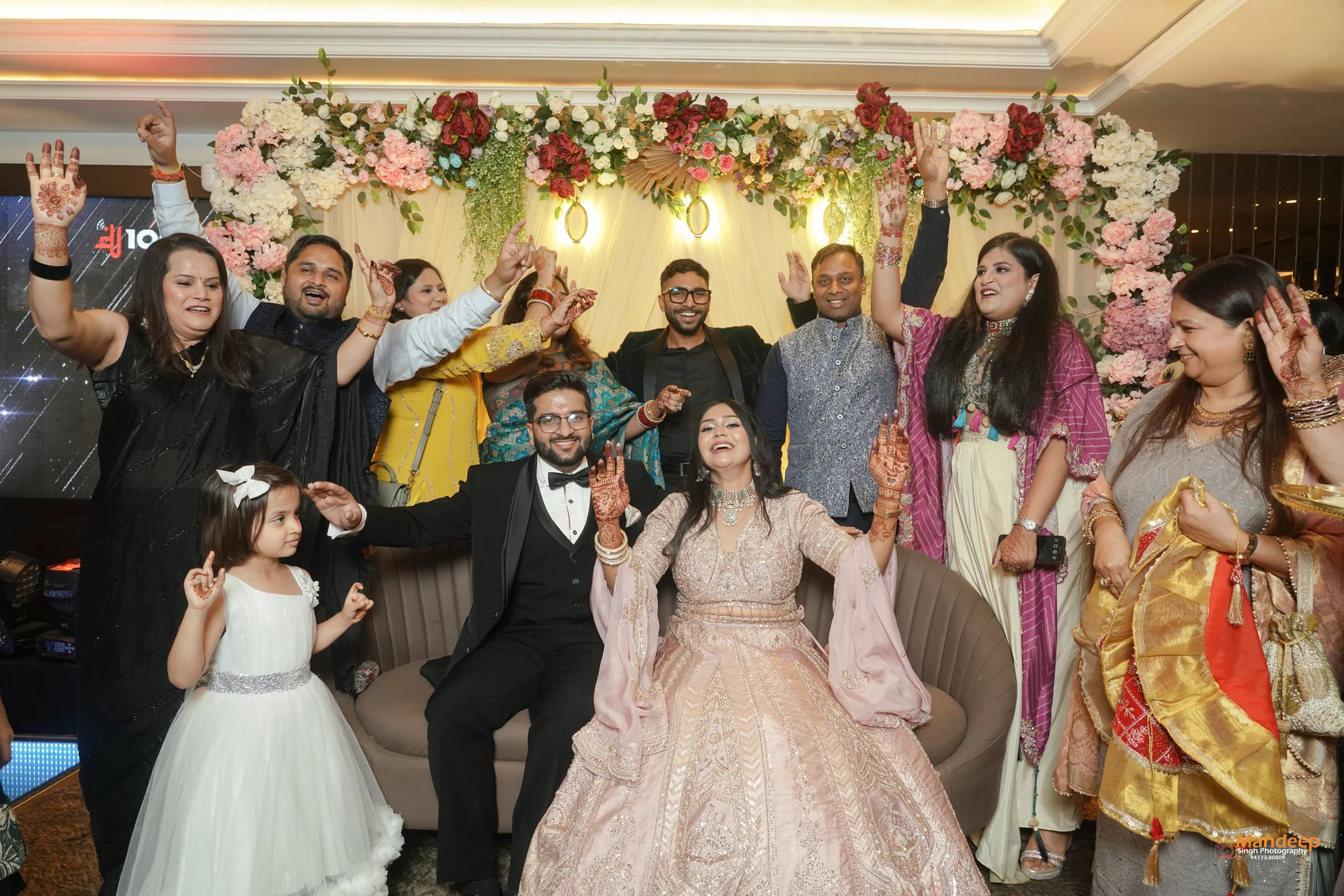 Tanya and Vyom celebrating with family and friends