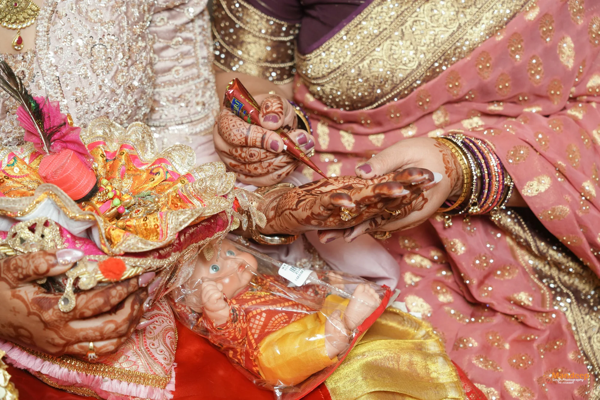 A close detail of henna and the engagement ritual